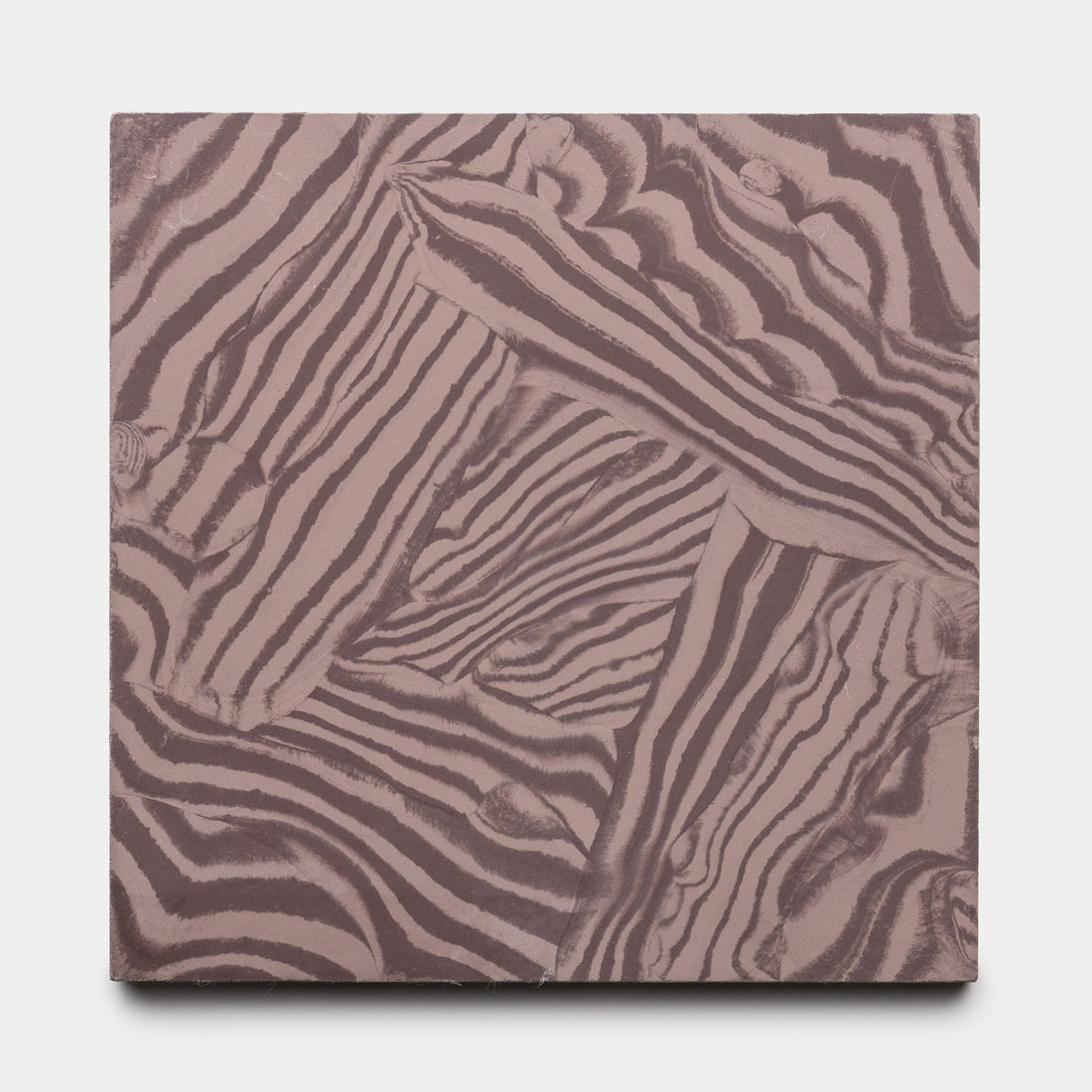 The Currents Aubergine + Tyrian 8x8 tile by Zia Tile features abstract, overlapping brown and beige zebra-like stripes in various directions on a square surface, offering a textured and patterned visual effect.