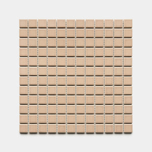 The Zia Tile Afterglow 1x1 sheet displays a grid of small, evenly spaced beige ceramic tiles with thin grout lines, all set against a plain white background.