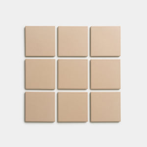 Nine Afterglow 4x4 tiles by Zia Tile, beige and square, arranged in a 3x3 grid on a white background.