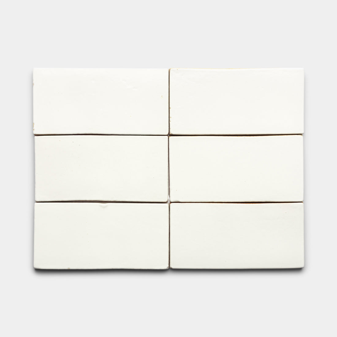 Six Albar 4x8 Rectangle tiles by Zia Tile are arranged in two rows of three on a plain light grey background.