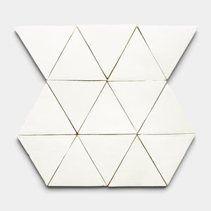 The Albar Triangle by Zia Tile features twelve white triangular pieces arranged in a hexagonal pattern on a light gray background.