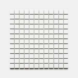 The Zia Tile Alpha White 1x1 features a grid of small, evenly spaced white square tiles arranged in rows and columns on a light gray background.