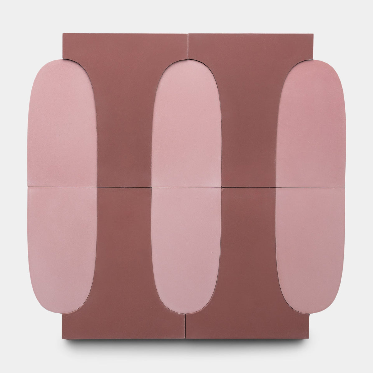 Arco Protea + Canyon, Sample by Zia Tile features four abstract geometric panels in pink and mauve tones with large rounded vertical shapes, creating a symmetrical, modern pattern inspired by handcrafted Zia Tile designs.