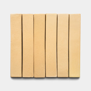 Six Arroyo Mini Bars by Zia Tile, in beige, are arranged vertically side by side against a plain white background.