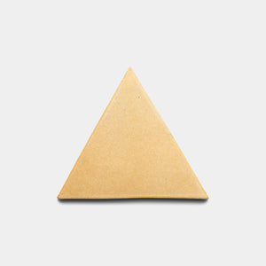 The Zia Tile Arroyo Triangle, a single plain triangular biscuit or cracker, is displayed on a light gray background.