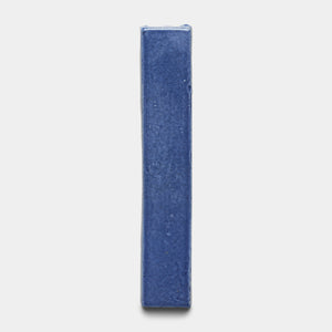 The Zia Tile Azul Mini Bar, a single rectangular blue tile, stands upright against a plain white background.