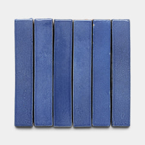 Six Azul Mini Bar tiles by Zia Tile are arranged vertically in a row against a plain white background.