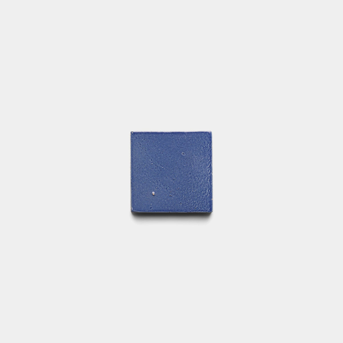 A small, square Zia Tile 
