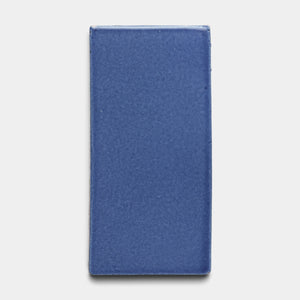 The Zia Tile Azul 4x8 Rectangle is a glossy ceramic tile in solid deep blue, shown against a plain white background.