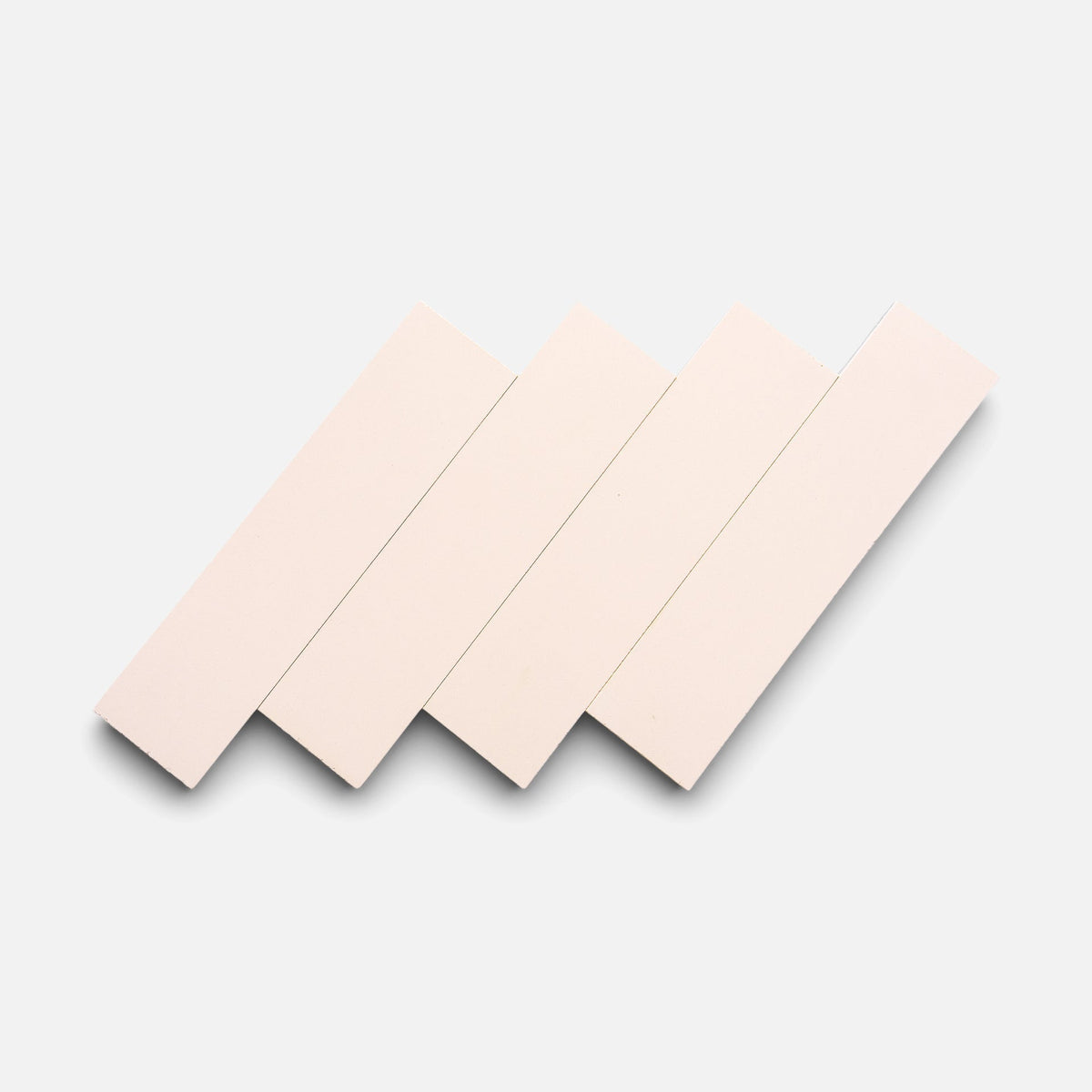 A row of Ballet Slipper 2x8 tiles by Zia Tile.