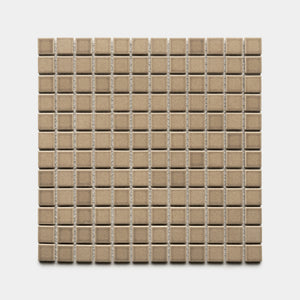 Barley 1x1 by Zia Tile features small, light brown ceramic tiles arranged in a square grid with even rows and columns on a white background.