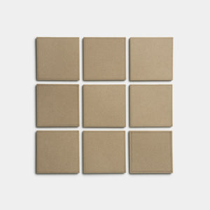Nine Barley 4x4 matte beige square tiles by Zia Tile, arranged in a three-by-three grid on a white background.