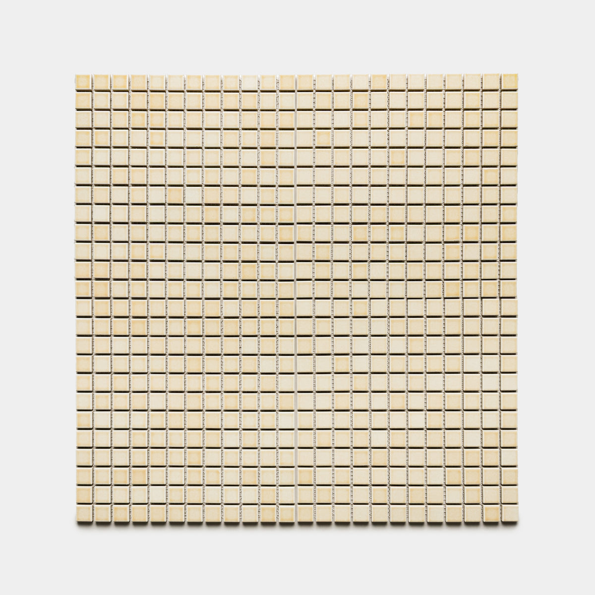 A square sheet of Zia Tile’s Birch 1x1 beige mosaic tiles is arranged in an evenly spaced grid on a white background, creating a clean, uniform geometric look.