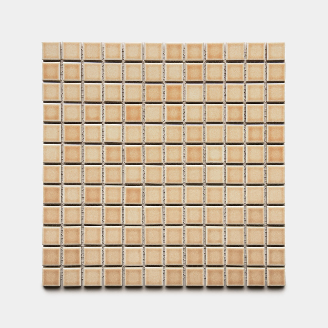 The Zia Tile Biscuit 1x1 features small, square beige ceramic tiles in a grid pattern with light grout lines, shown on a white background.