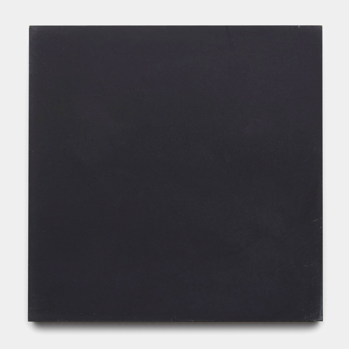 The Black 8x8 tile by vendor-unknown is a large, square, matte black cement tile with subtle texture and solid finish—ideal for kitchen backsplashes or bathroom floors, shown here on a crisp white background.