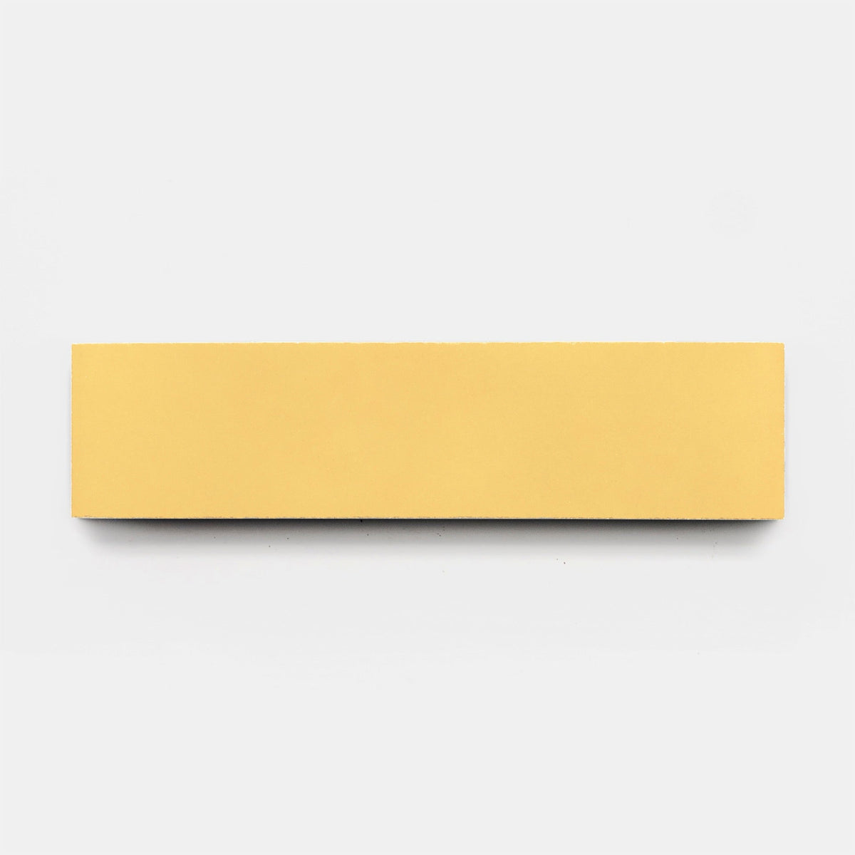 A Blonde 4x4 sample from vendor-unknown is centered on a plain white background, echoing the clean lines of handmade tile.