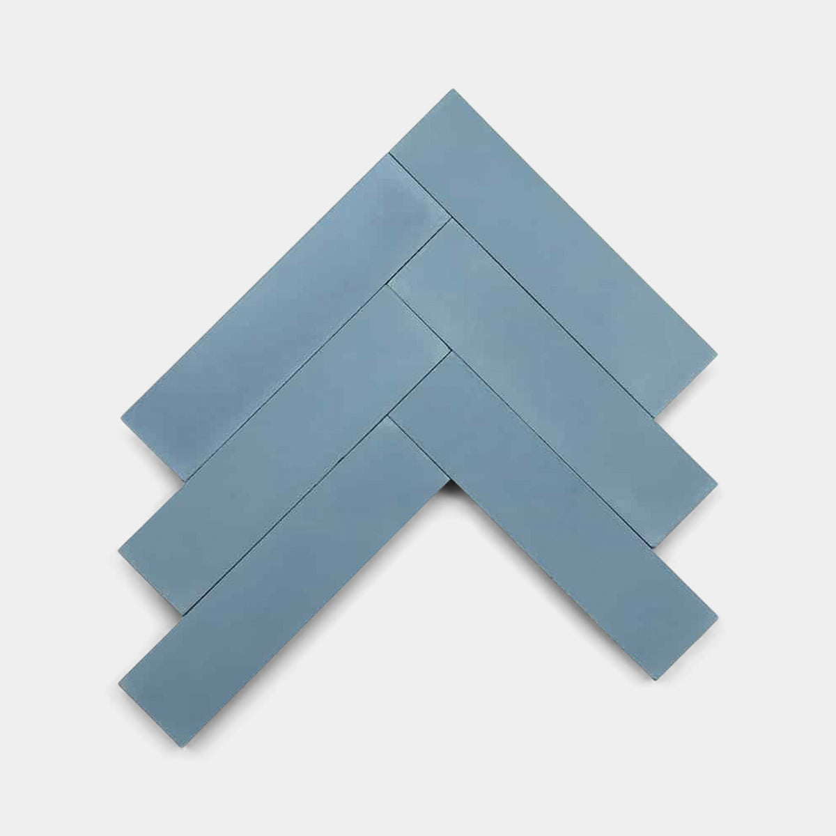 Five rectangular Carolina Blue 4x4 tiles from vendor-unknown are arranged in a herringbone pattern on a white background, creating an upward-pointing chevron shape.