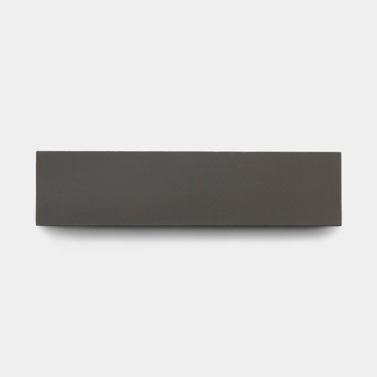 A rectangular, flat, black Charcoal 2x8 sample from vendor-unknown is shown against a plain white background, featuring a sleek finish similar to handmade tile.