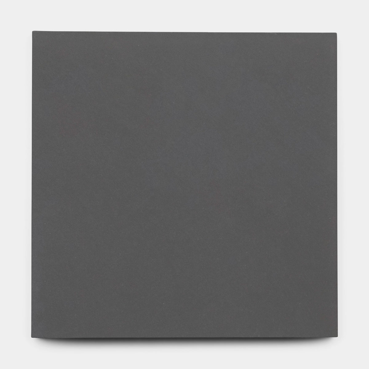 The Charcoal 2x8 sample tile by vendor-unknown is a plain, square tile in dark gray cement with a smooth matte finish, displayed on a light gray background.