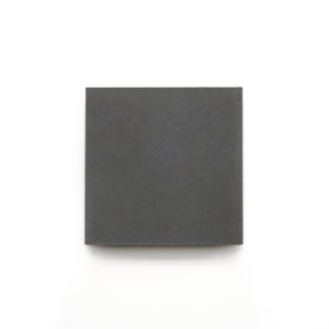 The Charcoal 4x4 tile is shown on a white background—ideal for bathroom floors or as a modern kitchen backsplash.