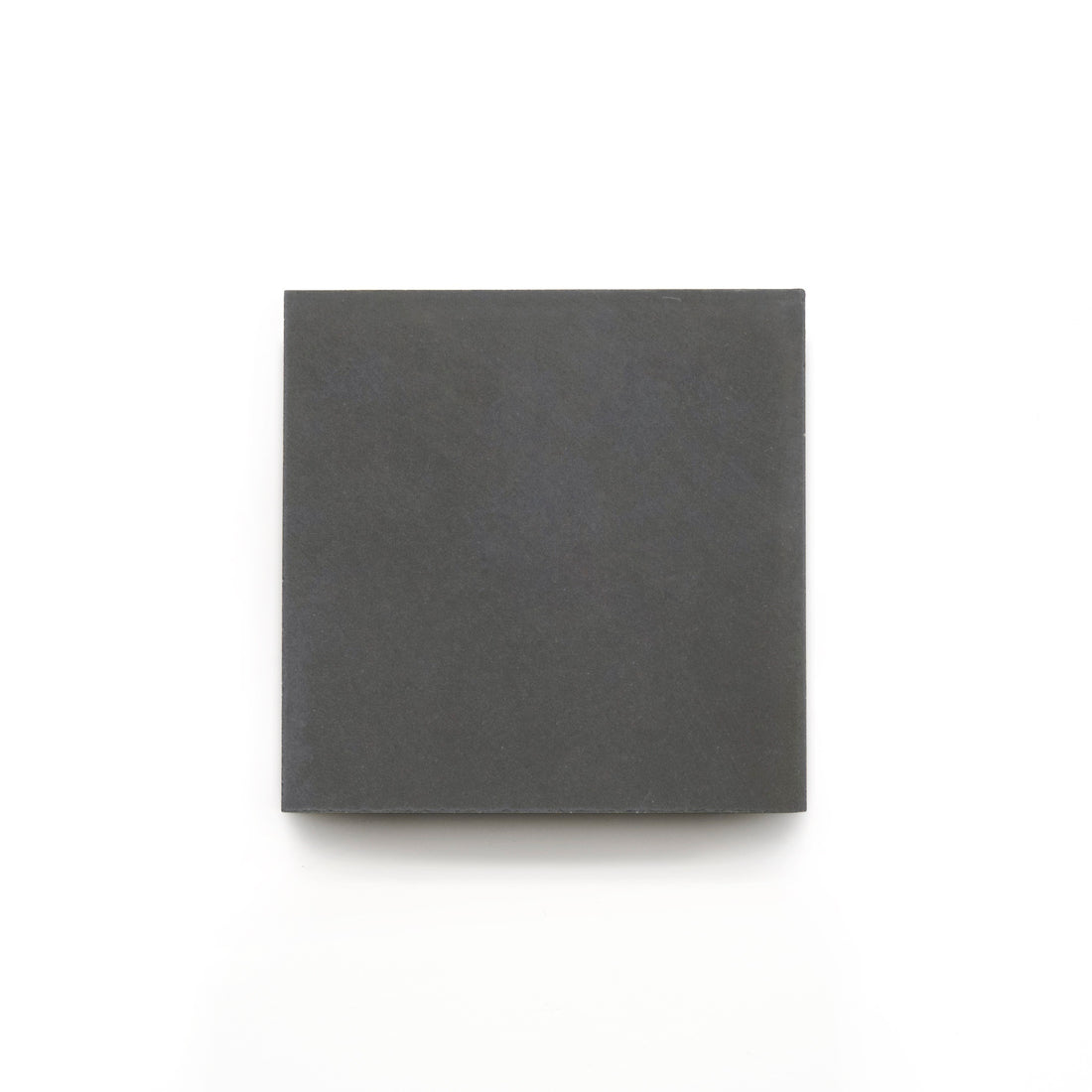 The Charcoal 4x4 tile is shown on a white background—ideal for bathroom floors or as a modern kitchen backsplash.