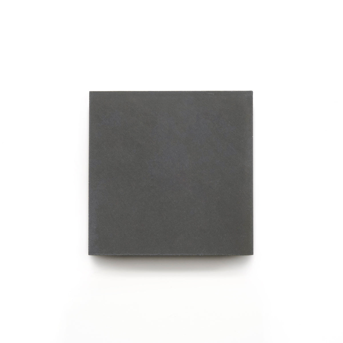 The Charcoal 4x4 tile is shown on a white background—ideal for bathroom floors or as a modern kitchen backsplash.