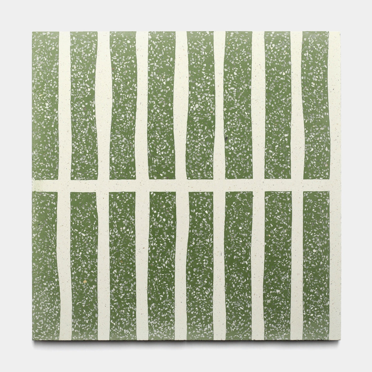 The Collins Saguaro 12x12 Sample by Zia Tile features alternating wavy green and speckled white stripes, intersected by three horizontal speckled lines for a grid-like, handmade cement tile look.