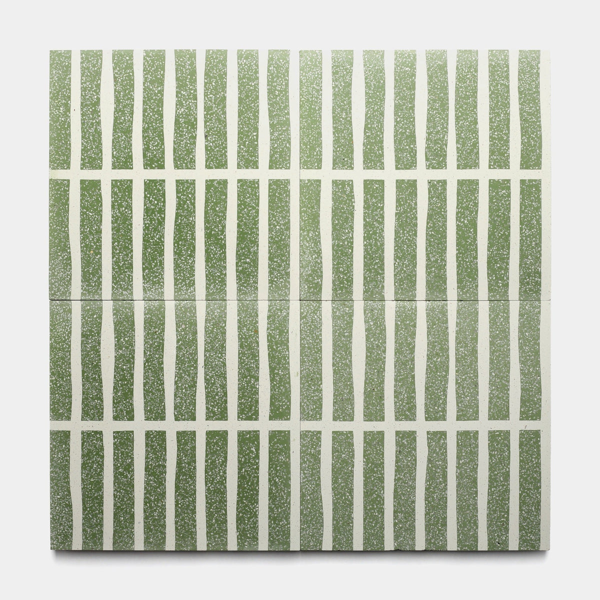 The Collins Saguaro 12x12 sample by Zia Tile features a geometric, grid-like pattern with vertical wavy green stripes intersected by straight horizontal white lines for an organic, textured look.