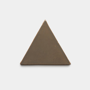 A single solid brown equilateral triangle, the Condesa Triangle by Zia Tile, is centered on a plain white background.