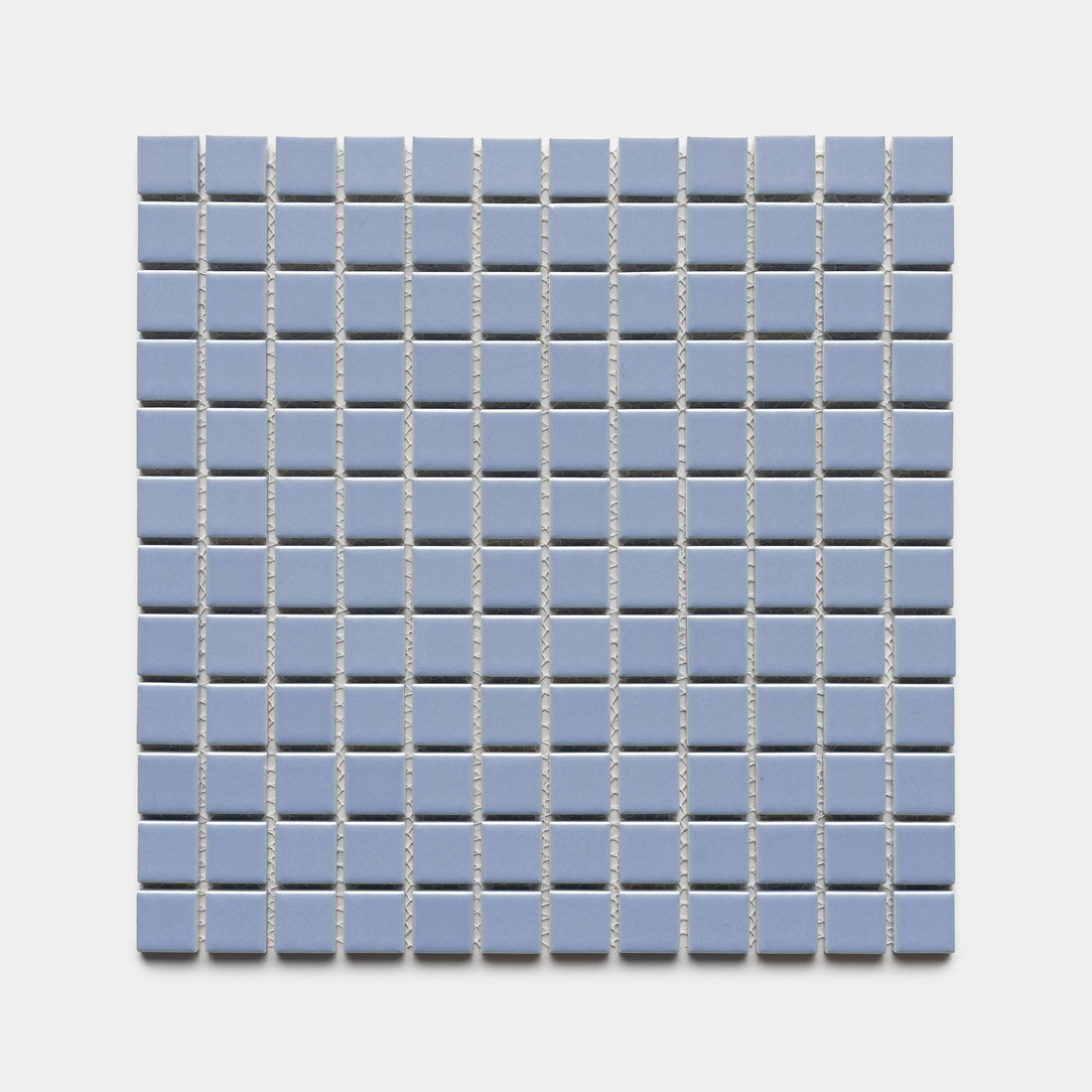 Cornflower 1x1 by Zia Tile features a square grid of small, light blue ceramic tiles arranged in even rows and columns on a white background.