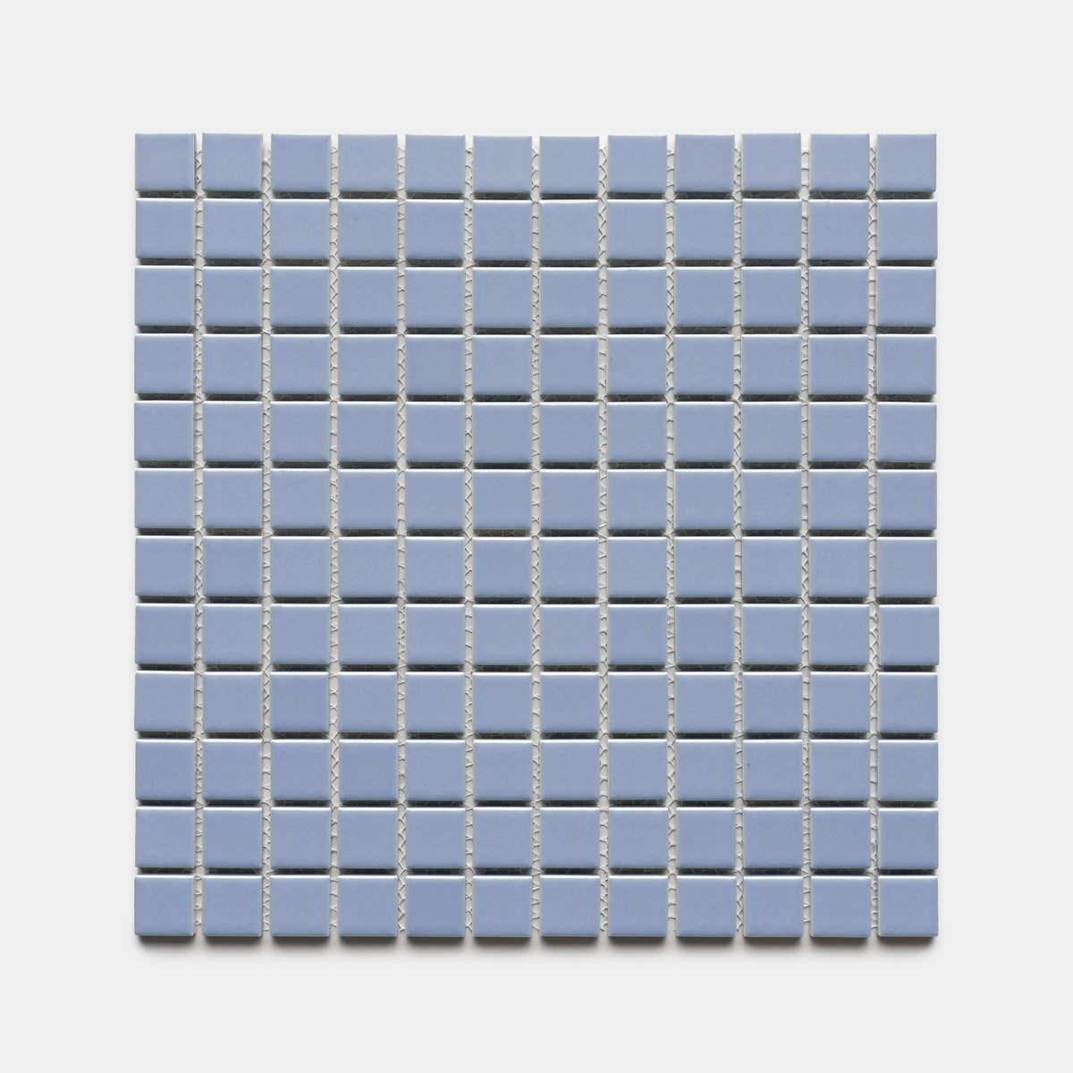 Cornflower 1x1 by Zia Tile features a square grid of small, light blue ceramic tiles arranged in even rows and columns on a white background.