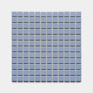 Cornflower 1x1 by Zia Tile features a square grid of small, light blue ceramic tiles arranged in even rows and columns on a white background.