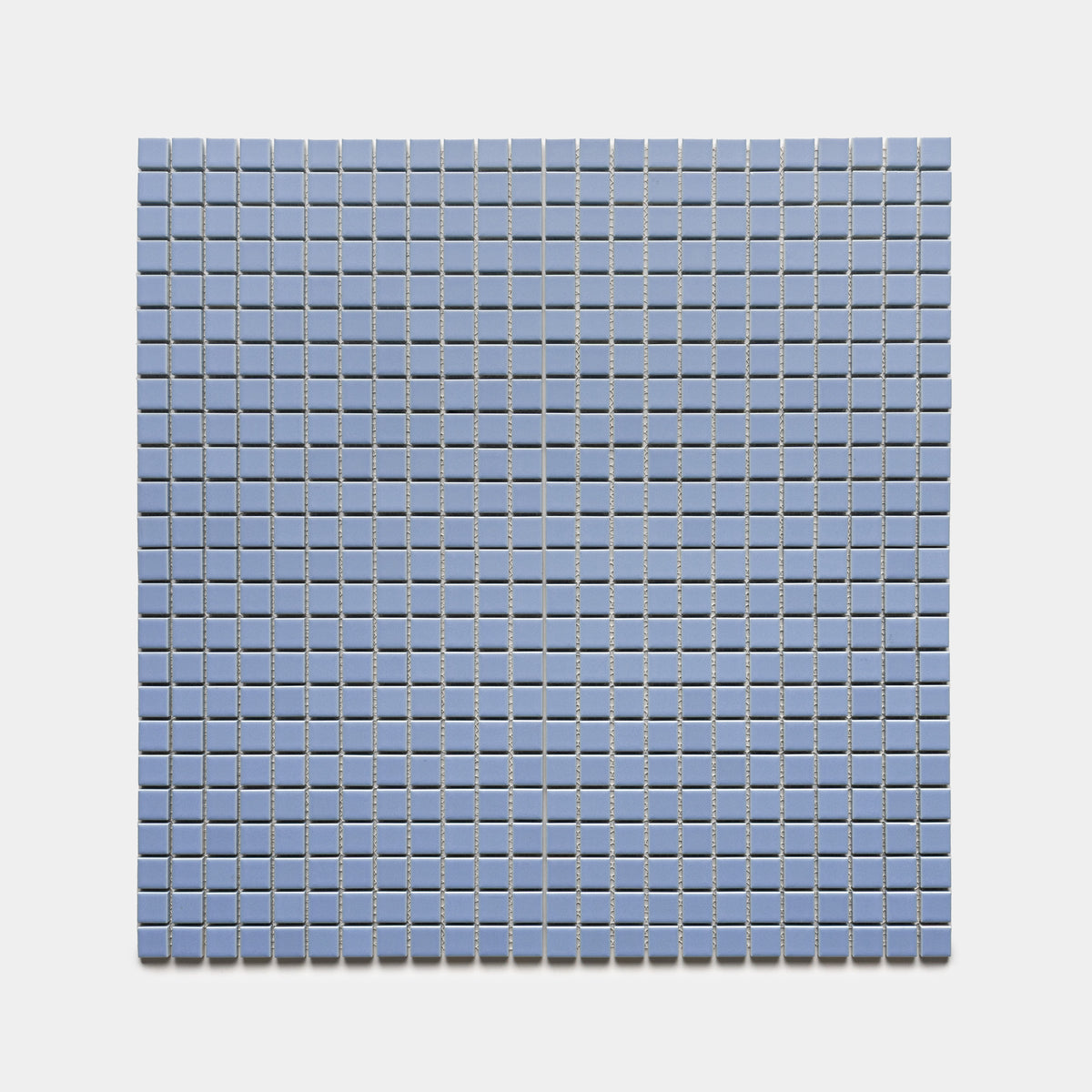 The Zia Tile Cornflower 1x1 features a grid of evenly spaced, small square blue tiles arranged in rows and columns on a light gray background.