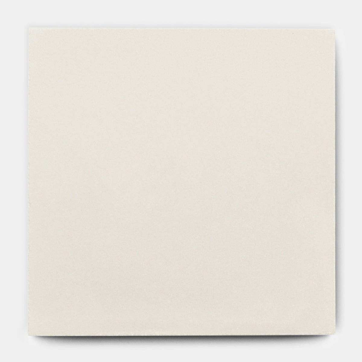 The Cotton 8x8 tile sample by vendor-unknown is a square, off-white ceramic tile with a smooth matte finish—perfect for achieving an artisanal look. Photographed on a plain white background.
