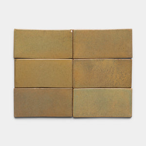 Six Zia Tile Creosote 4x8 Rectangle bricks, tan with a slightly rough texture and subtle color variations, are arranged in two rows of three on a plain white background.