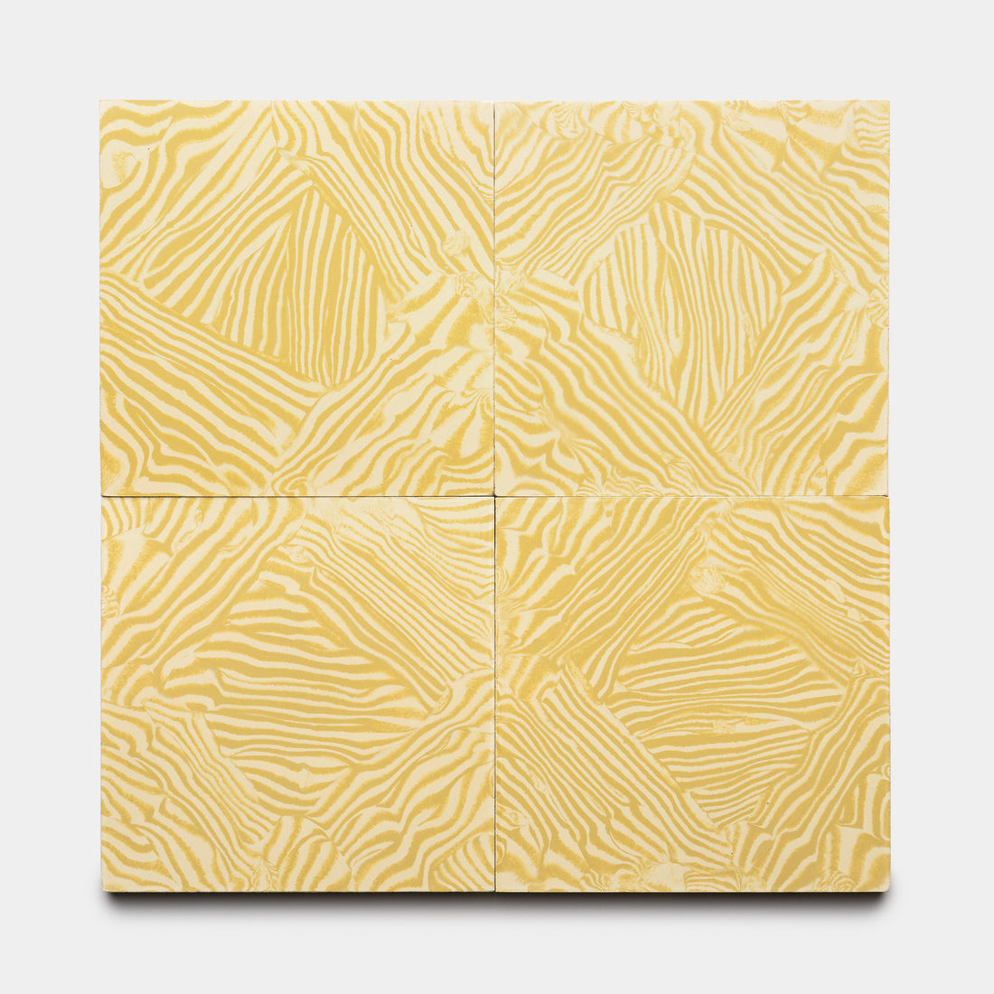 Four Currents Mustard + Solar 8x8 tiles from Zia Tile are arranged in a 2x2 grid, each displaying a yellow and white abstract pattern that forms a seamless, textured design on a plain white background.