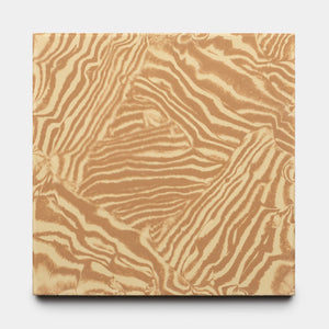 Currents Saddle + Clay 8x8 by Zia Tile features a square canvas with swirling, abstract zebra-inspired patterns in tan and cream on a plain white background, adding movement and texture.