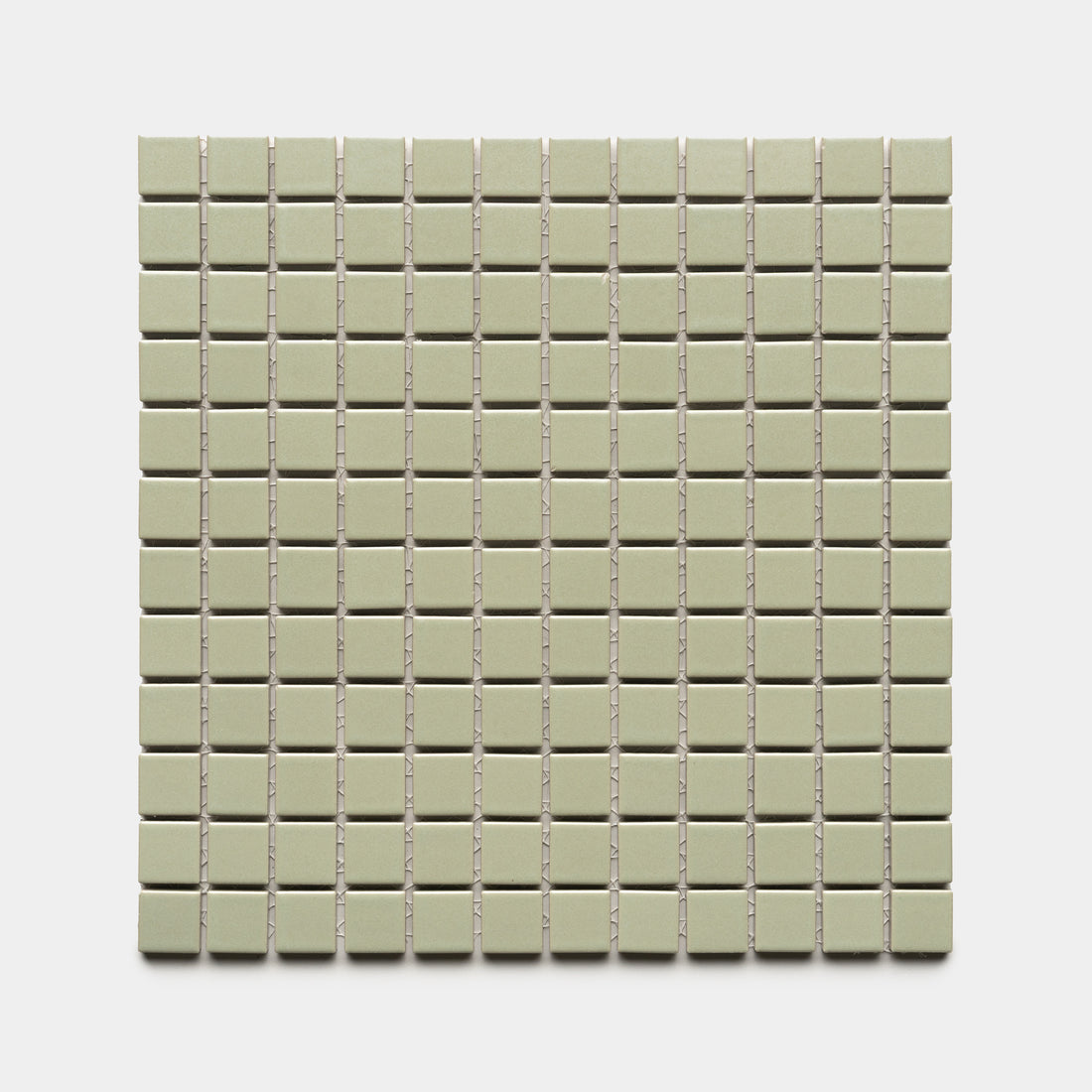 The Cypress 1x1 by Zia Tile features a square grid of small, light green ceramic tiles arranged evenly on a white background.