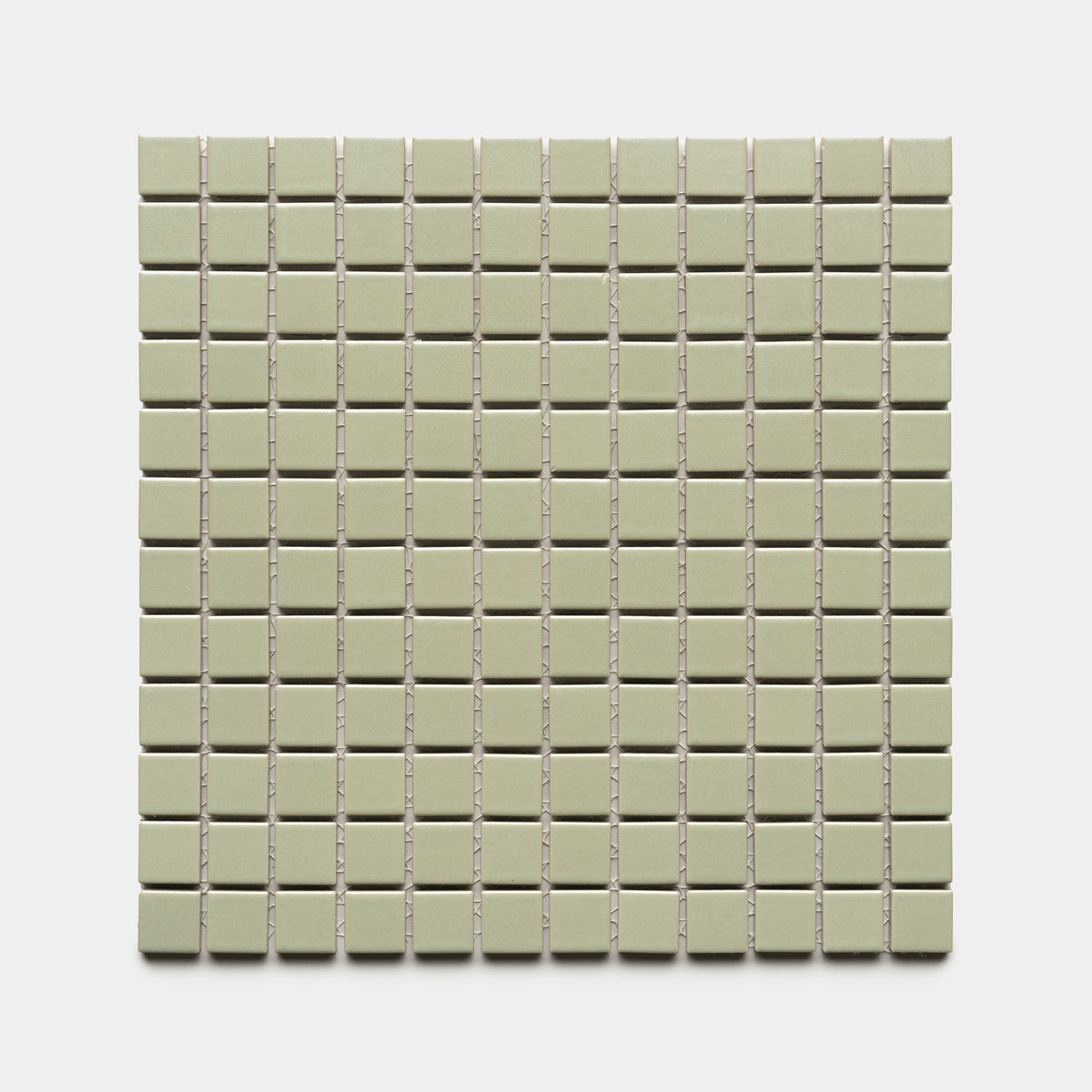 The Cypress 1x1 by Zia Tile features a square grid of small, light green ceramic tiles arranged evenly on a white background.