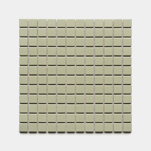 The Cypress 1x1 by Zia Tile features a square grid of small, light green ceramic tiles arranged evenly on a white background.