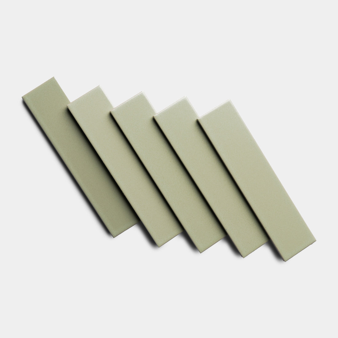 Five rectangular Cypress 2x8 tiles by Zia Tile are arranged diagonally in a neat, overlapping row on a white background.