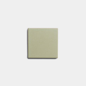 A single Cypress 4x4 tile by Zia Tile, plain and square in beige with smooth edges and a matte finish, is centered on a light gray background.