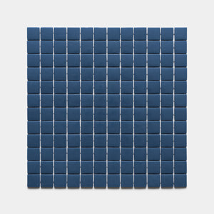 A grid of evenly spaced, small, square Damascus 1x1 tiles by Zia Tile is arranged on a plain white background.