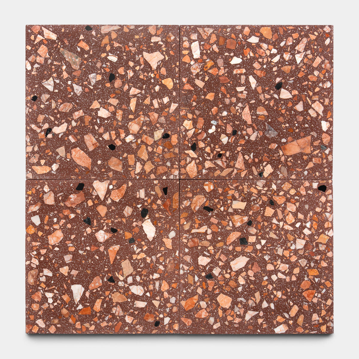 Four Zia Tile Date Palm 6x6 samples, with a reddish-brown base and scattered white, beige, black, and orange chips, are arranged in a 2x2 grid against a plain background.