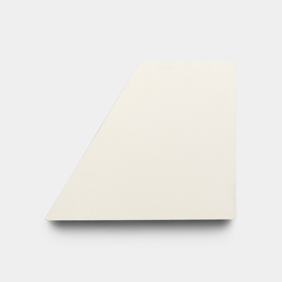 The Derby Gypsum + Cotton sample by Zia Tile is a white, handcrafted tile with an irregular quadrilateral shape and angled edges, shown on a plain light gray background.