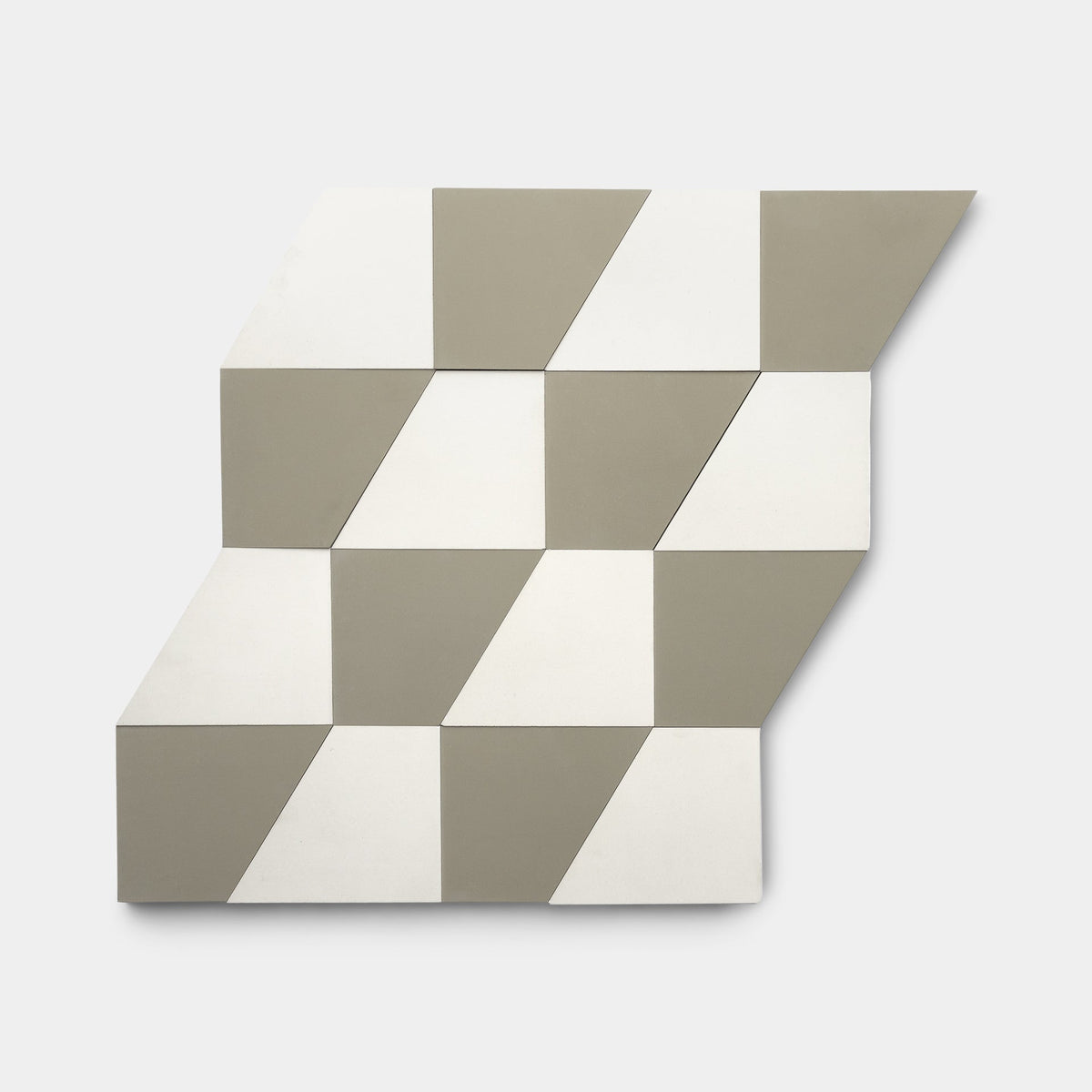 The Derby Gypsum + Cotton Sample by Zia Tile features 12 handcrafted tiles in a zigzag layout with alternating light gray and white parallelograms on a crisp white background—perfect as geometric wall art.