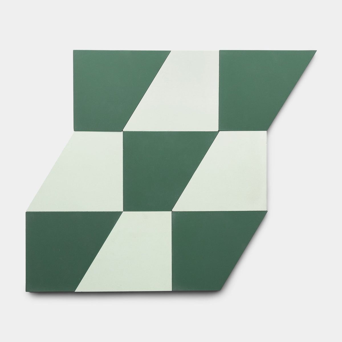 The Derby Julep + Noble Green Sample by Zia Tile features green and white parallelogram and triangle shapes in an abstract geometric pattern on a polygonal canvas with a white background.
