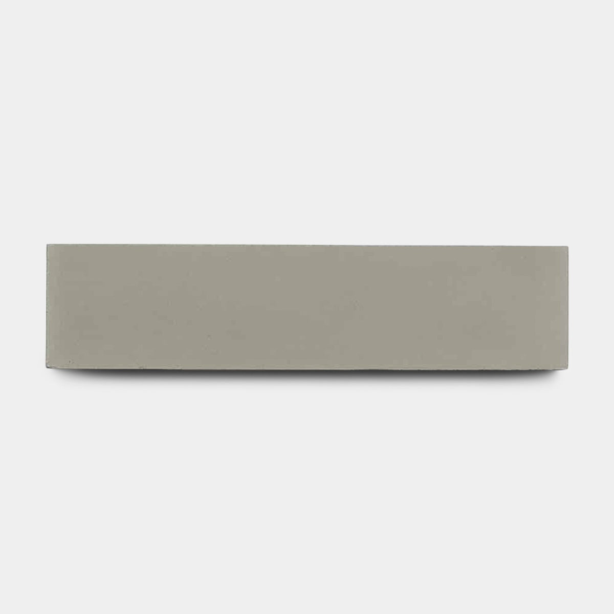 A Desert Grey 2x8 ceramic tile sample by vendor-unknown is displayed flat and rectangular against a plain white background.