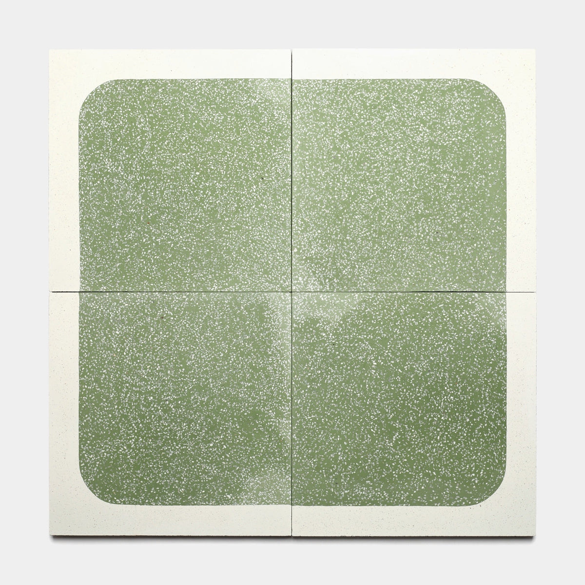 Four Draper Saguaro 12x12 tiles by Zia Tile form a large rounded green square with white speckles and borders when arranged in a grid—ideal as a sample for your next project.