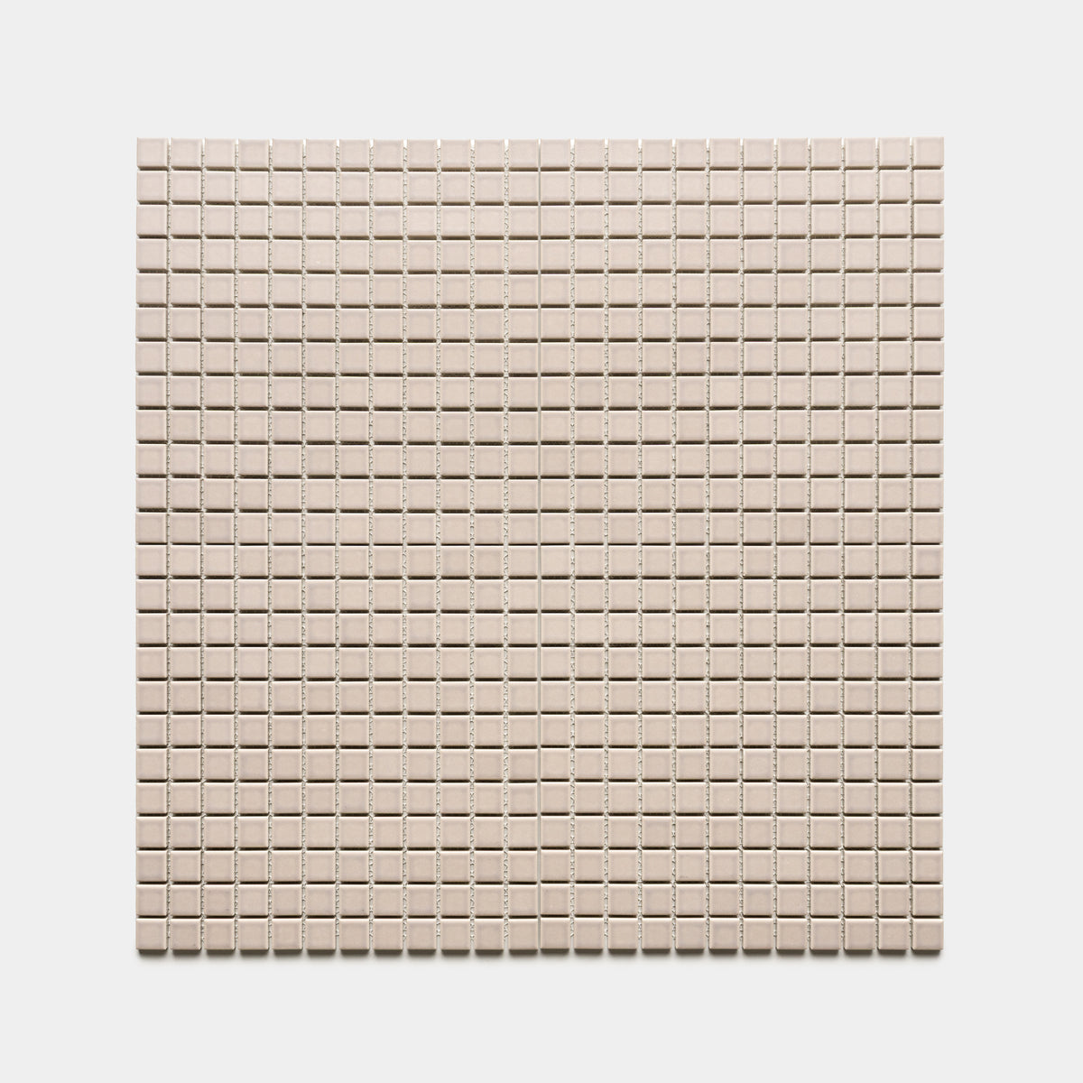 A square sheet of Zia Tile's Earl Grey 1x1 small, uniform, light beige mosaic tiles arranged in a grid pattern against a plain white background.